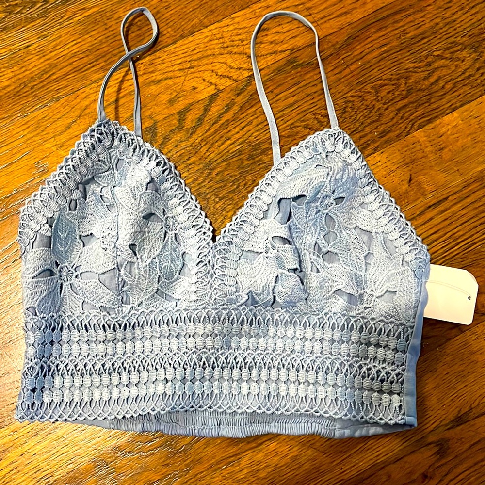 Short light baby blue top.
